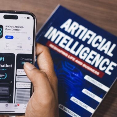Webpage of Ai Chatbot, a prototype AI Smith Open chatbot, is seen on the website of OpenAI, on a apple smartphone. Examples, capabilities, and limitations are shown.